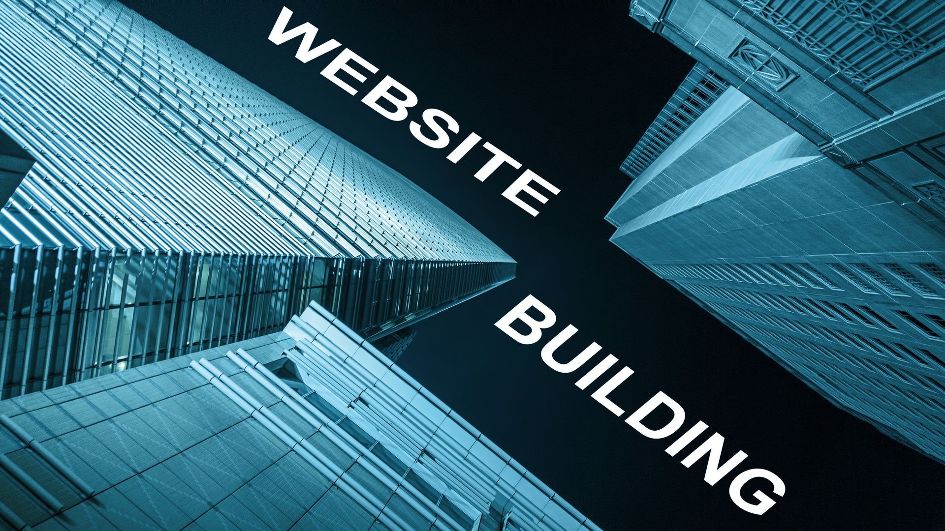 Modern buildings from low angle at night with text website building.